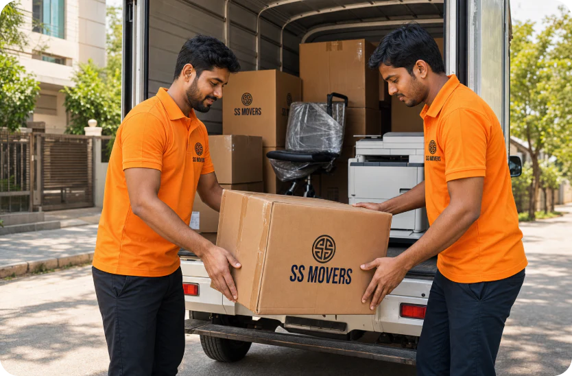 SS Movers crew loading a box into a truck with office equipment